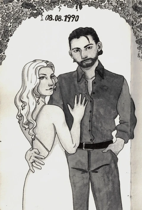 Eine junge Frau und ein junger Mann, die sich unter Blüten umarmen